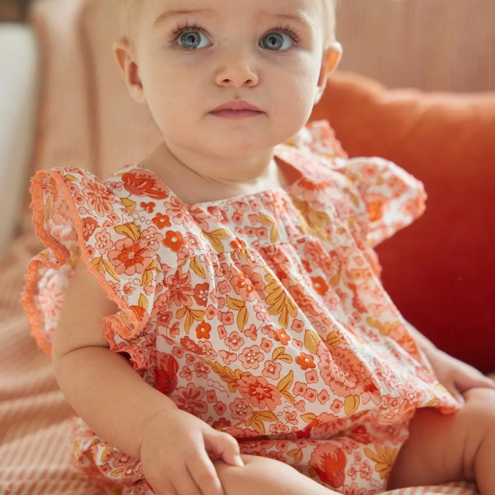 Bonheur du Jour Lionetta ecru rose floral baby romper with ruffle sleeves
