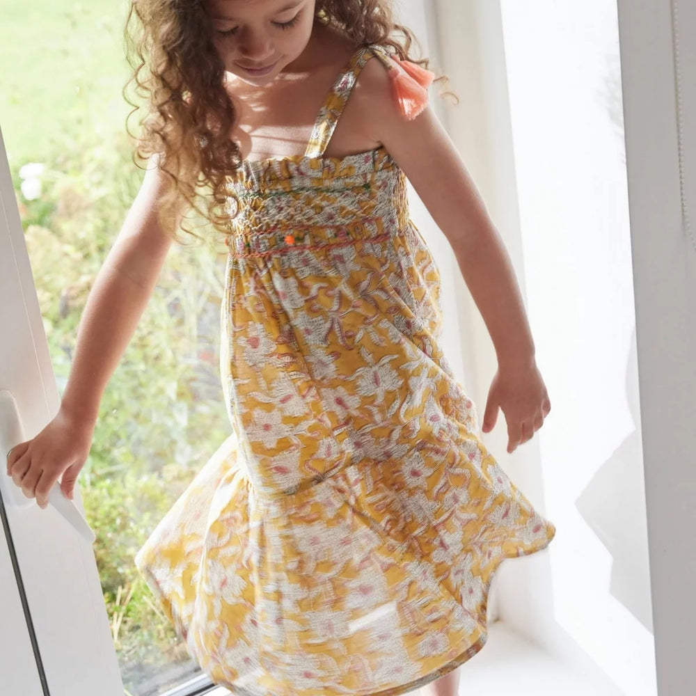 Bonheur du Jour Loriane curcuma dress smocked cotton floral tassel straps
