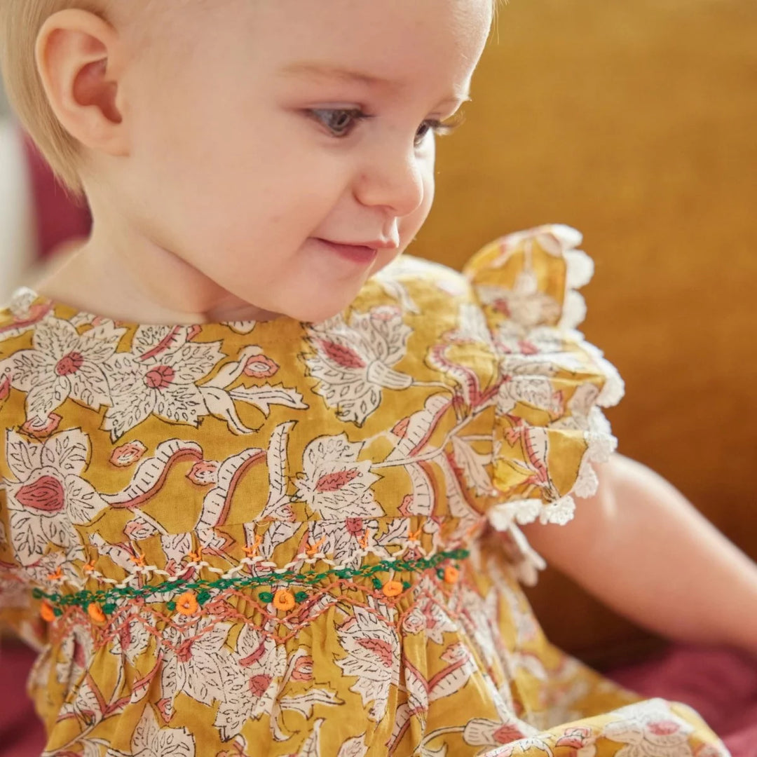 Bonheur du Jour Ammi curcuma floral baby romper with smocking

