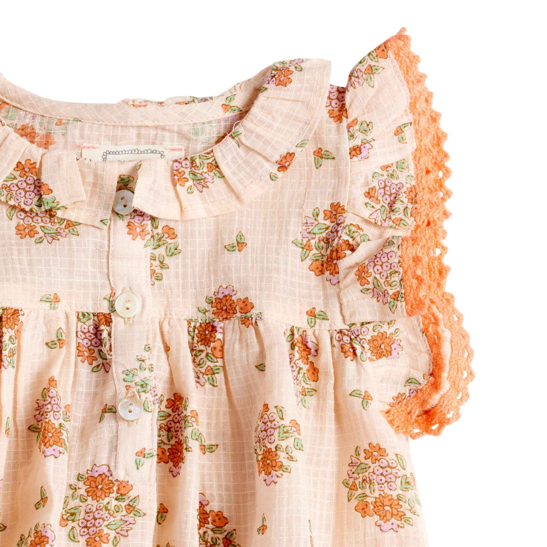 Bonheur du Jour Mahaut rose floral baby romper with lace ruffle sleeves
