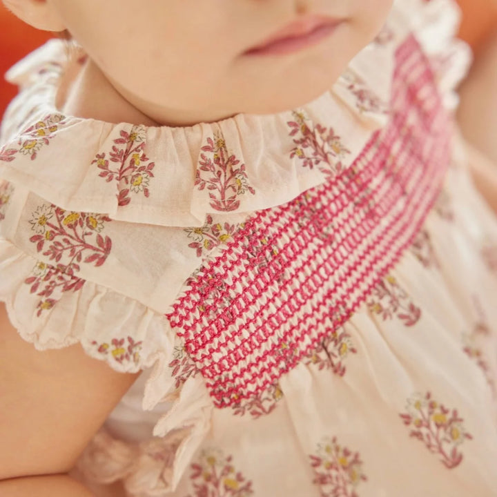 Bonheur du Jour Blossom rose floral baby romper with smocked bodice

