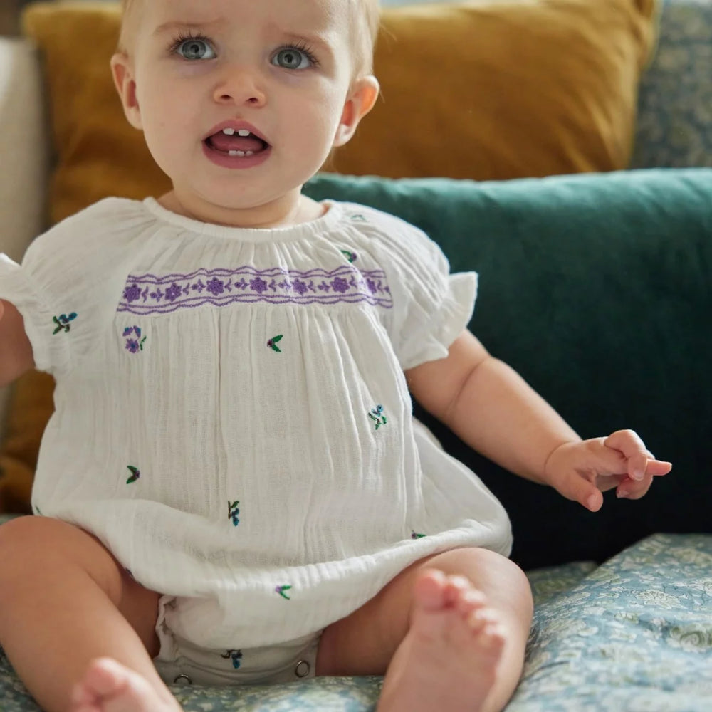 Bonheur du Jour Gaby ecru baby romper with floral embroidery and smocked yoke
