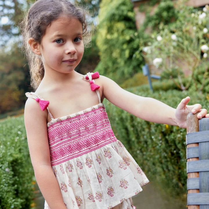 Bonheur du Jour Isadora pink floral girls smocked top with tassel straps
