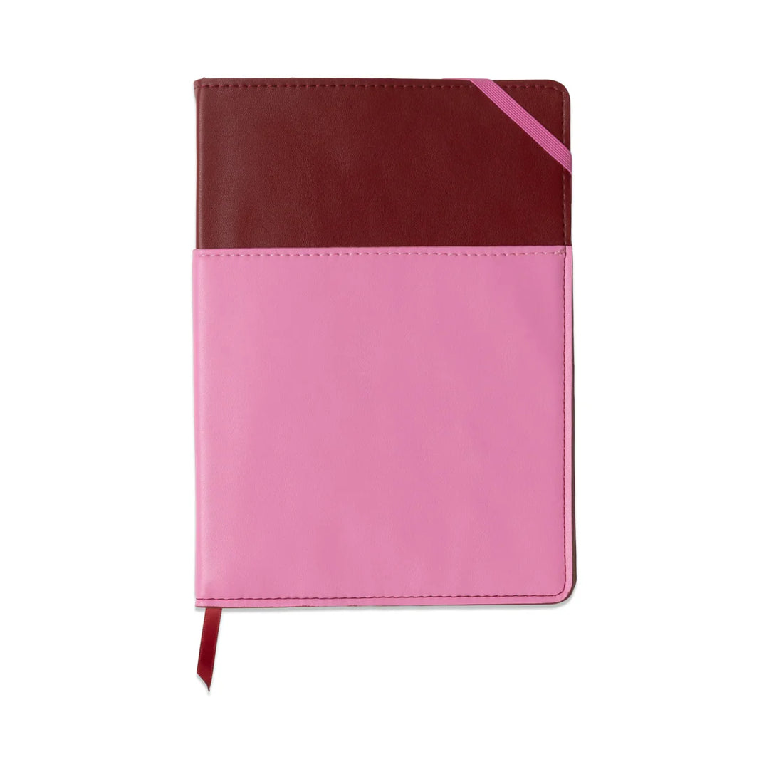 Blue and navy vegan leather pocket journal with color block design and elastic closure
