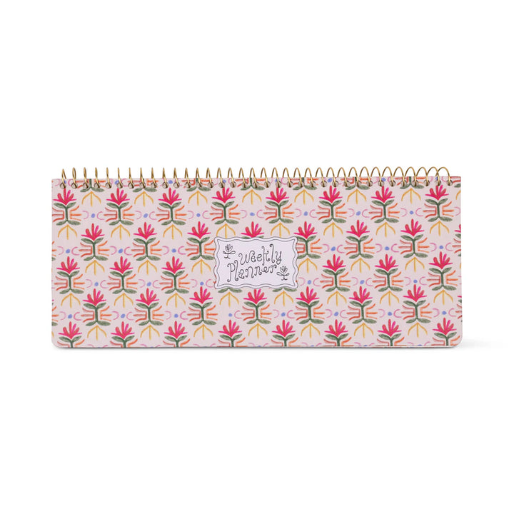 Colorful weekly planner pad with patterned design and spiral binding for desk organization
