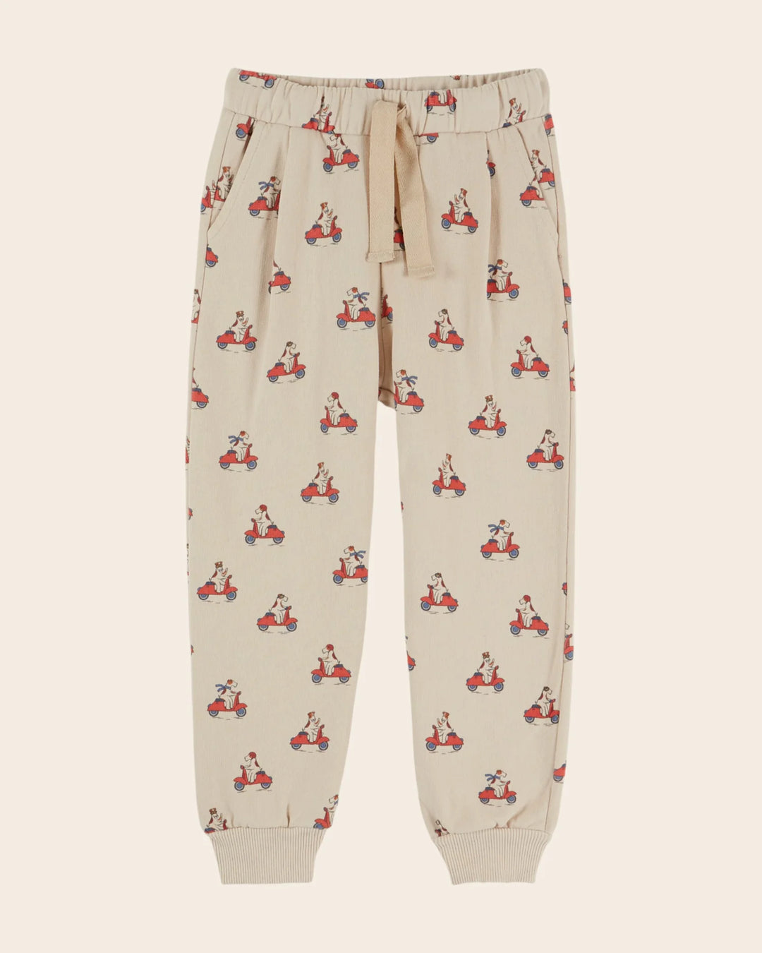 Kids Grand Dog Print Joggers in Farine by Emile et Ida, featuring a playful all-over dog pattern and comfortable casual design.