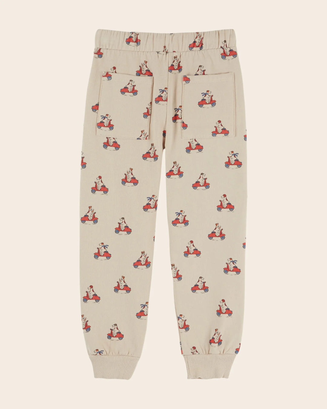 Kids Grand Dog Print Joggers in Farine by Emile et Ida, featuring a playful all-over dog pattern and comfortable casual design.