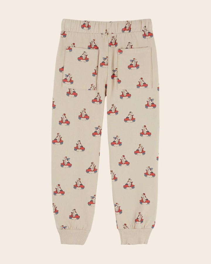 Kids Grand Dog Print Joggers in Farine by Emile et Ida, featuring a playful all-over dog pattern and comfortable casual design.