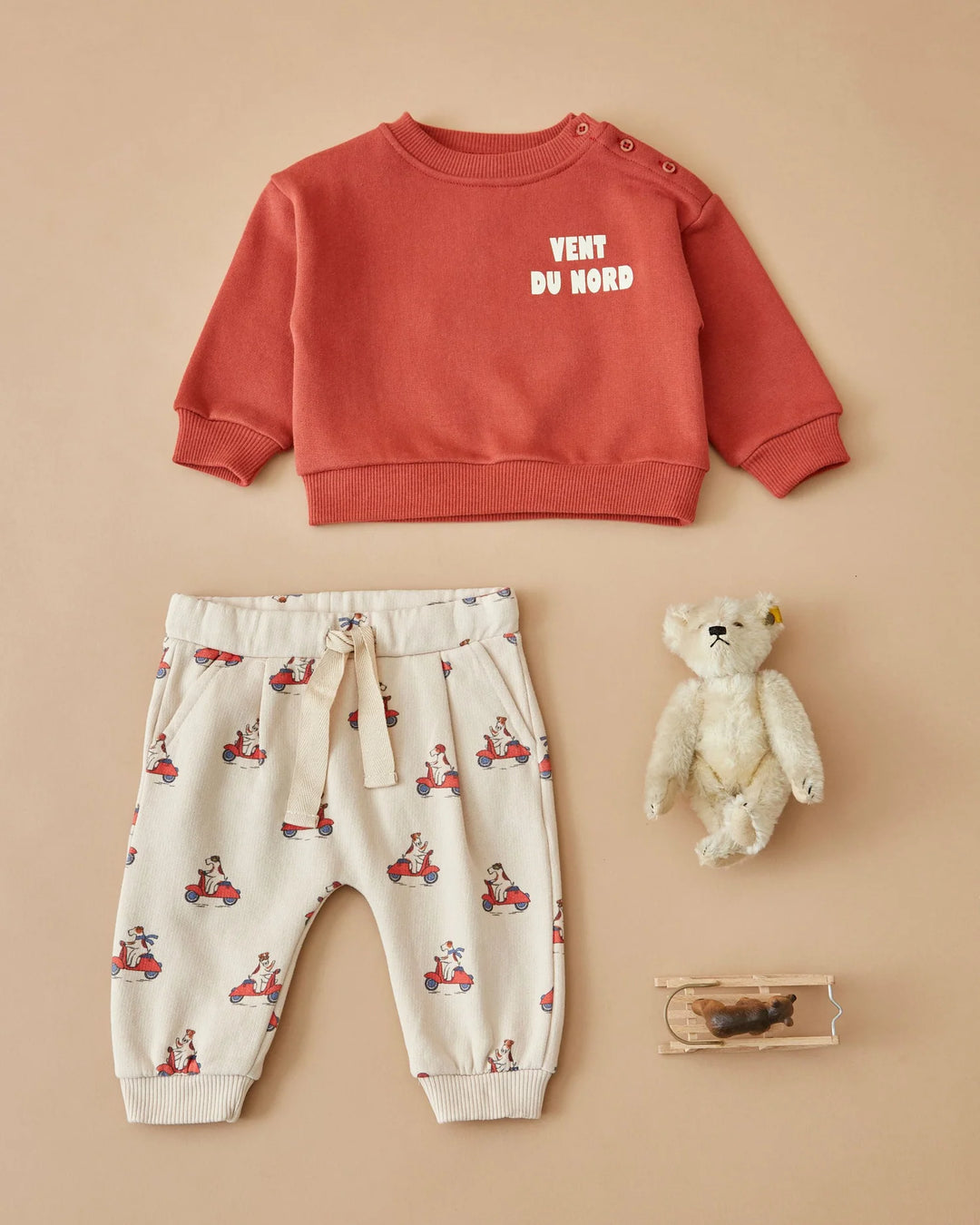 Kids Grand Dog Print Joggers in Farine by Emile et Ida, featuring a playful all-over dog pattern and comfortable casual design.