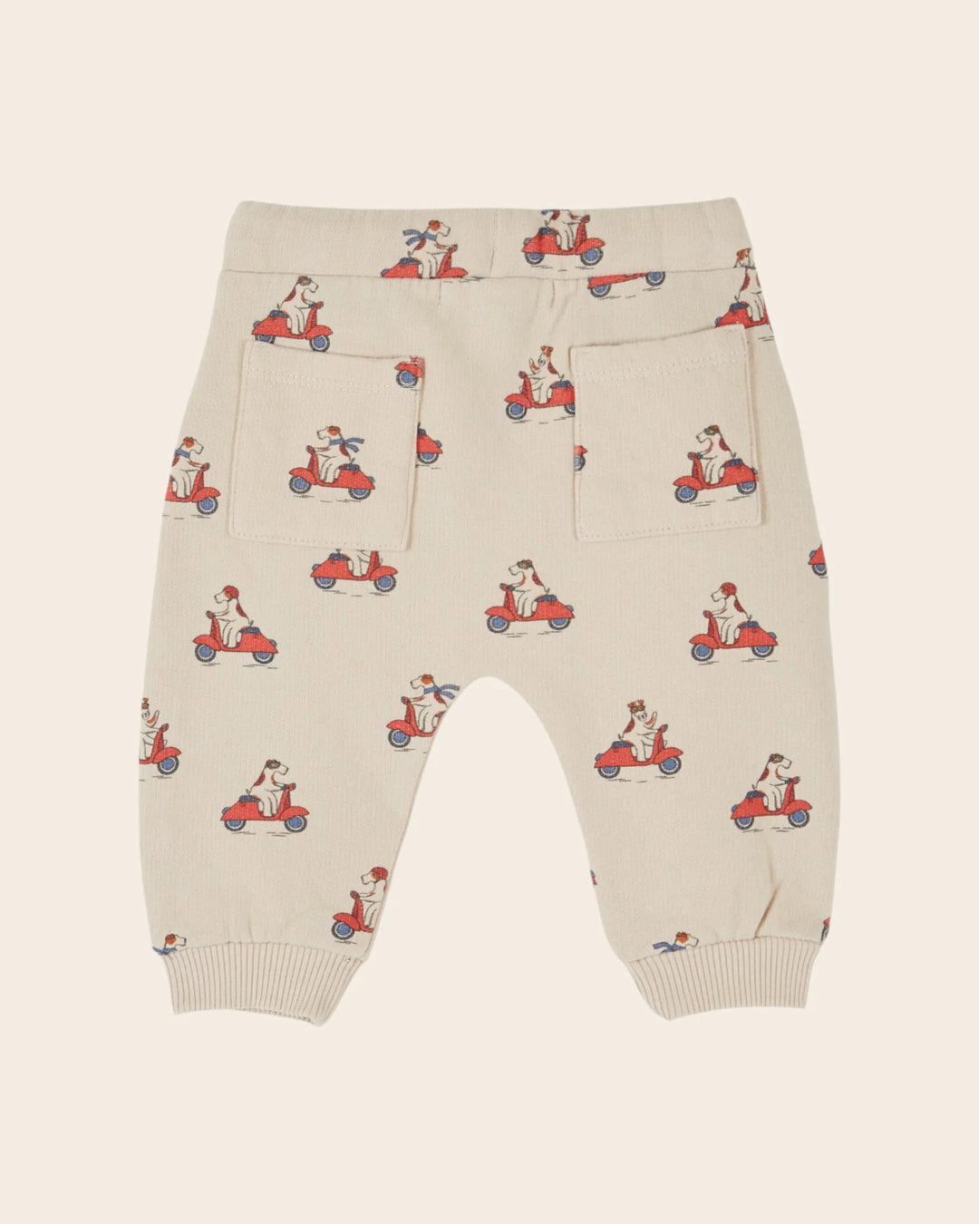 Kids Grand Dog Print Joggers in Farine by Emile et Ida, featuring a playful all-over dog pattern and comfortable casual design.