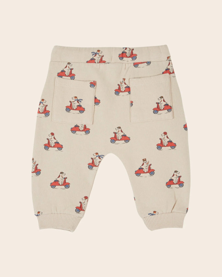 Kids Grand Dog Print Joggers in Farine by Emile et Ida, featuring a playful all-over dog pattern and comfortable casual design.