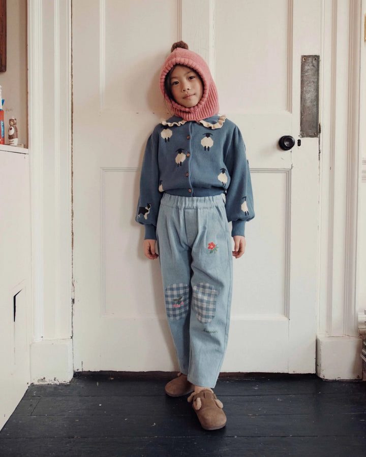 Emile et Ida girls embroidered denim pants in washed blue cotton with reinforced knee patches and a relaxed carrot fit