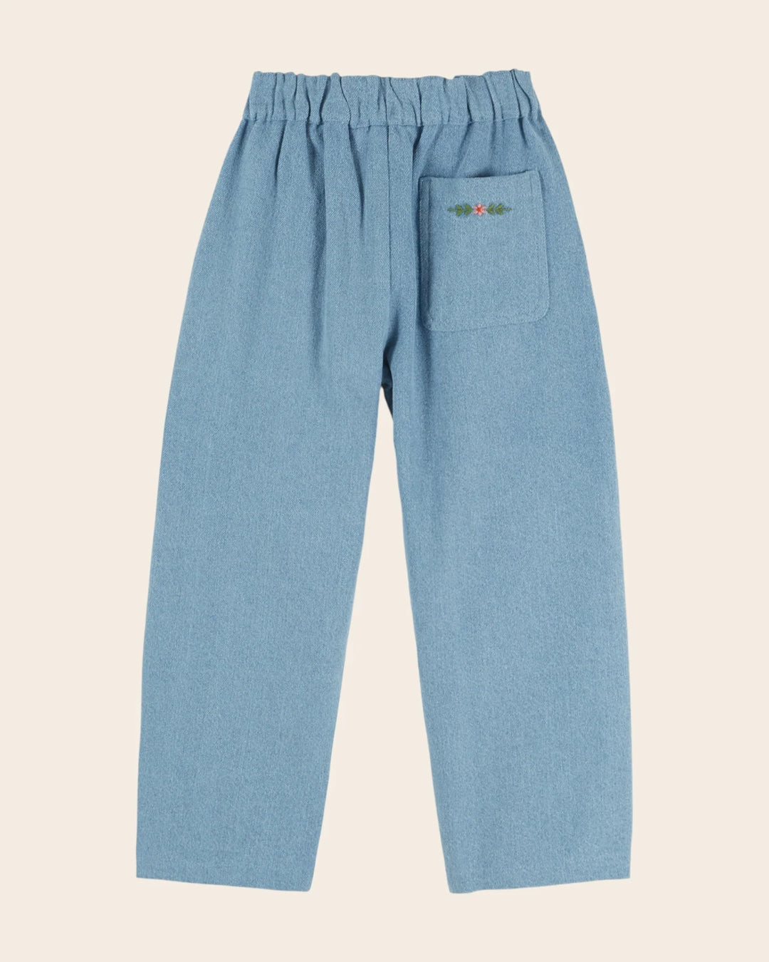 Emile et Ida girls embroidered denim pants in washed blue cotton with reinforced knee patches and a relaxed carrot fit