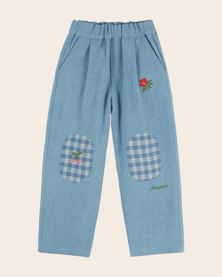 Emile et Ida girls embroidered denim pants in washed blue cotton with reinforced knee patches and a relaxed carrot fit