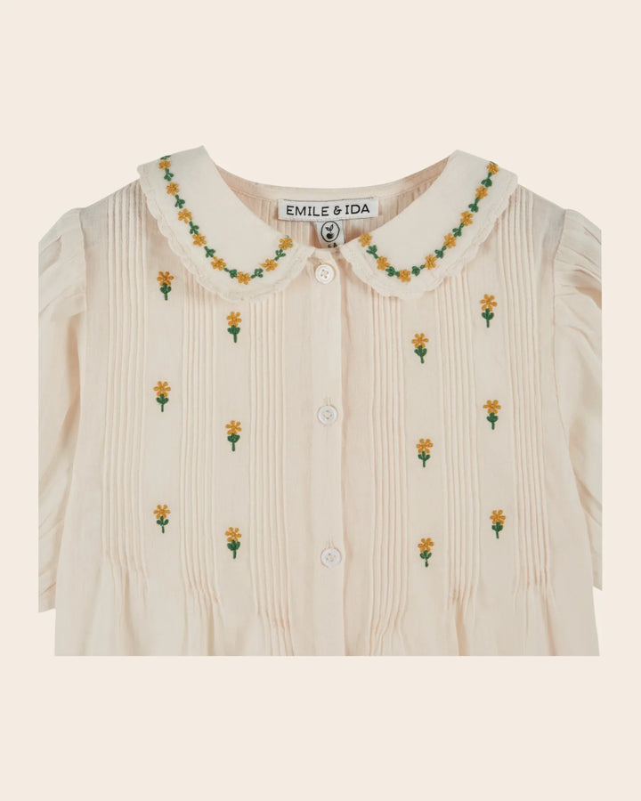 girls cream embroidered blouse with floral detail
