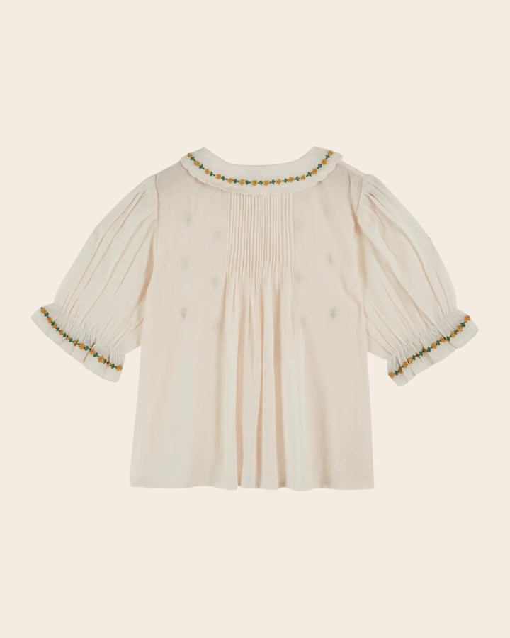 girls cream embroidered blouse with floral detail

