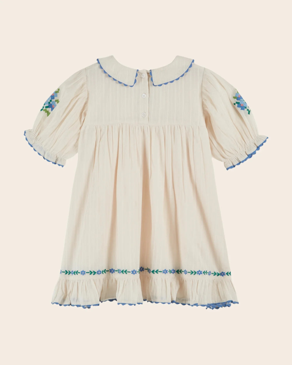 girls cream embroidered cotton dress with blue scalloped trim
