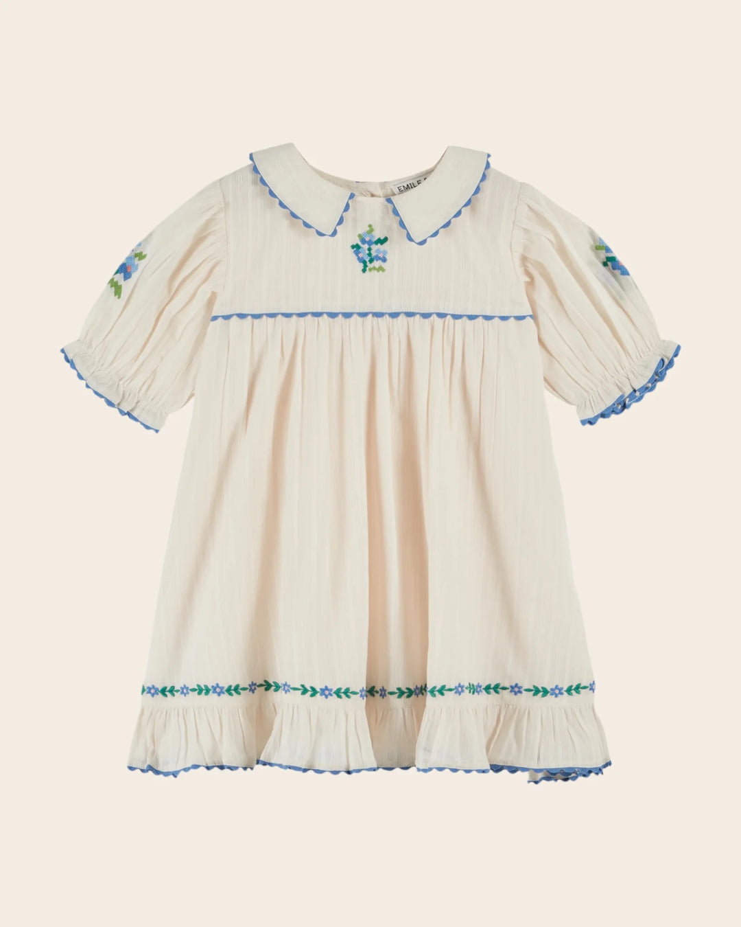 girls cream embroidered cotton dress with blue scalloped trim
