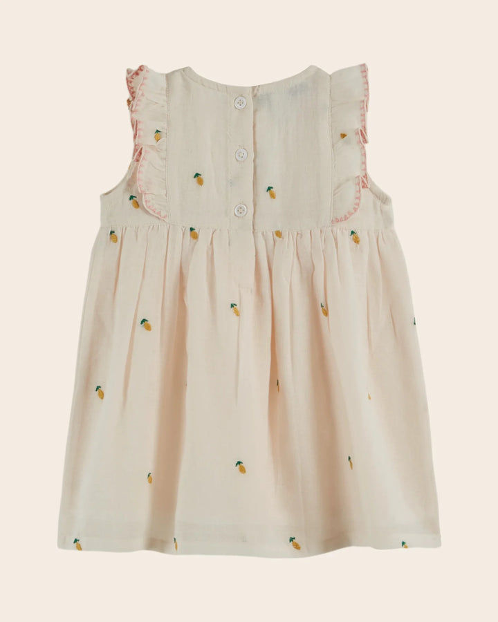 baby girl cream lemon embroidered dress with ruffle bib
