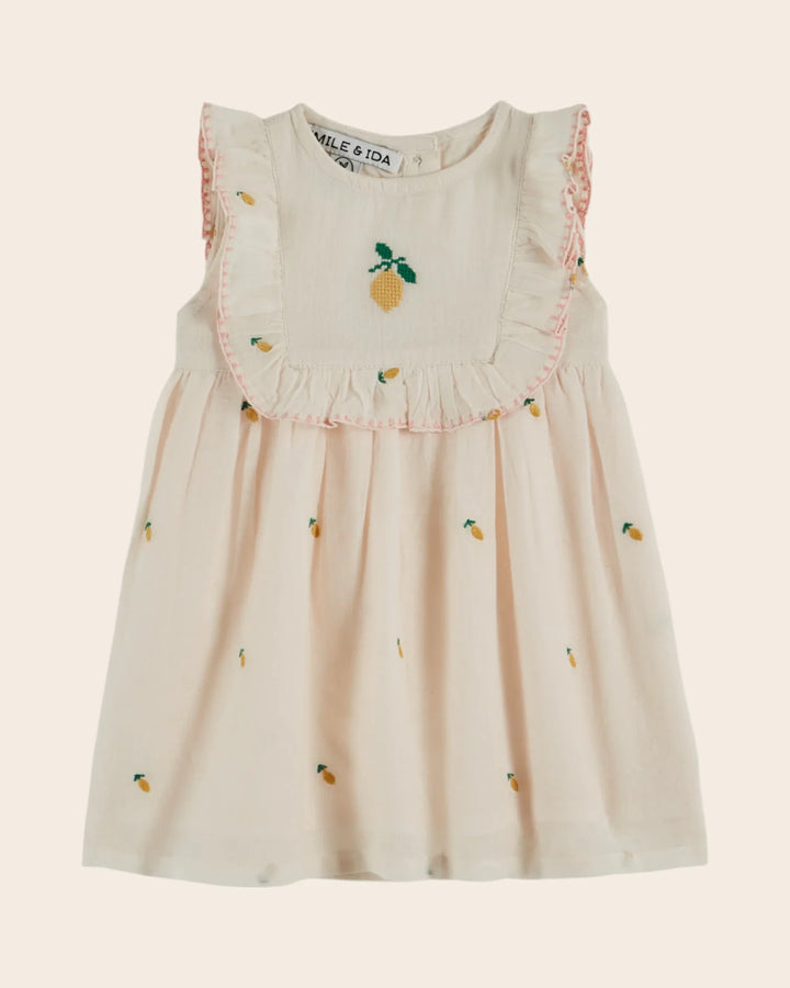 baby girl cream lemon embroidered dress with ruffle bib
