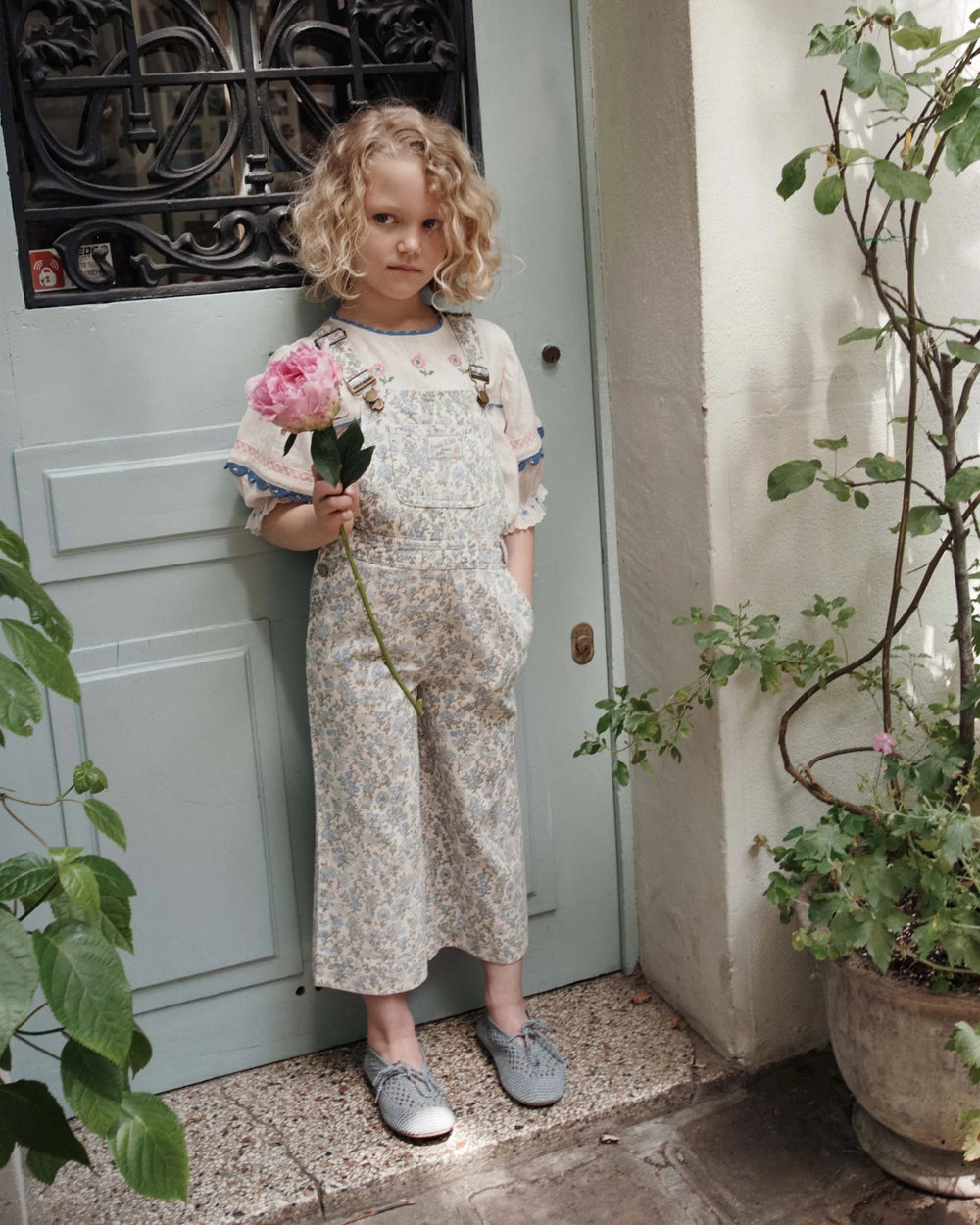 girls cream embroidered cotton blouse with blue trim
