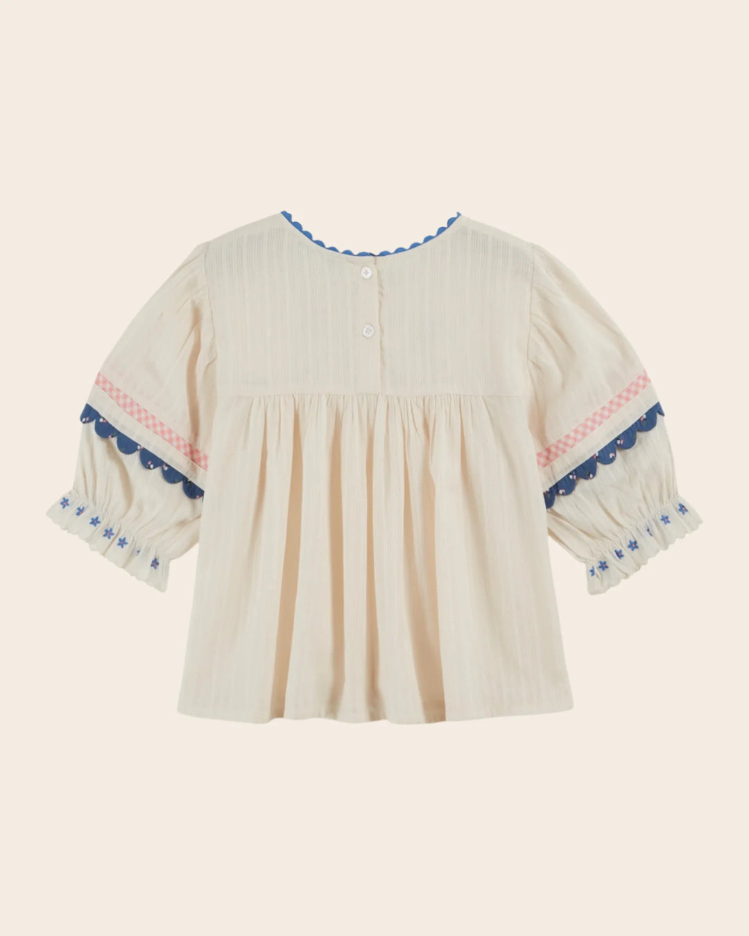girls cream embroidered cotton blouse with blue trim
