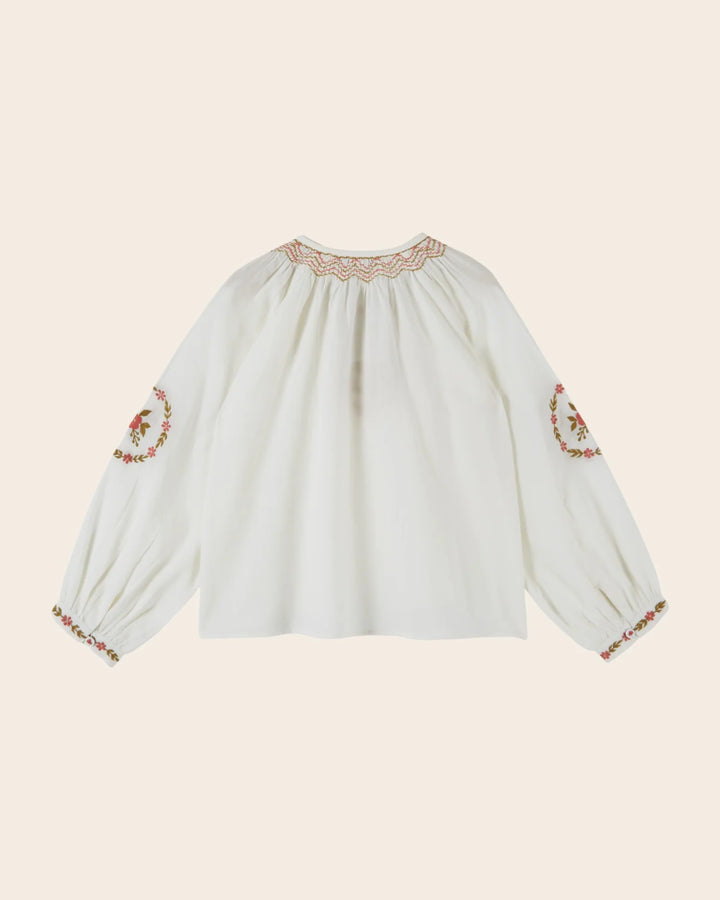 Back view of the Emile et Ida ethnic embroidered blouse for girls in ecru.