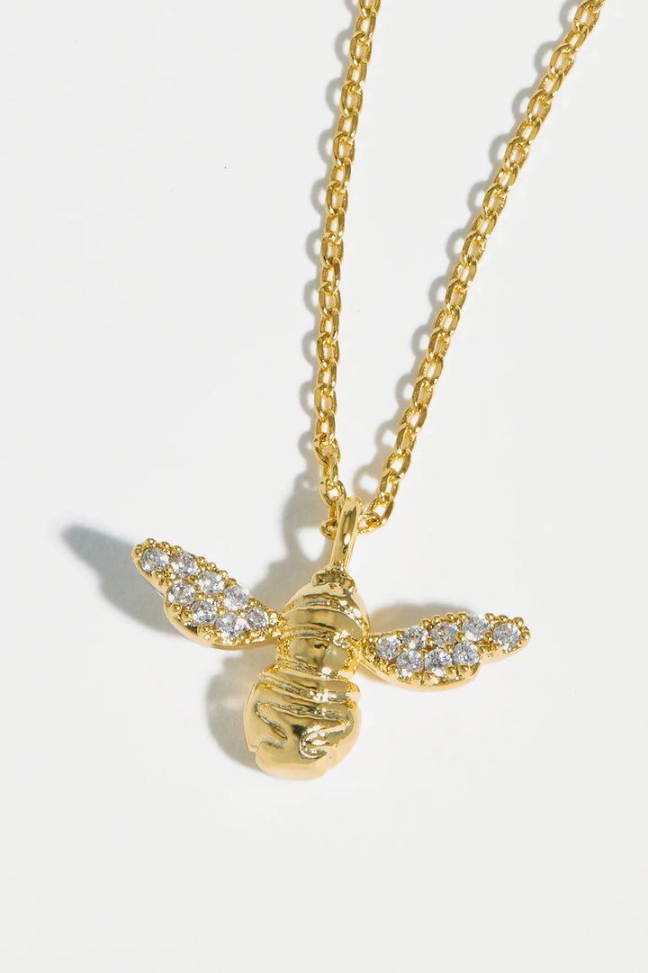 Estella Bartlett gold plated bee pendant necklace with cubic zirconia wings