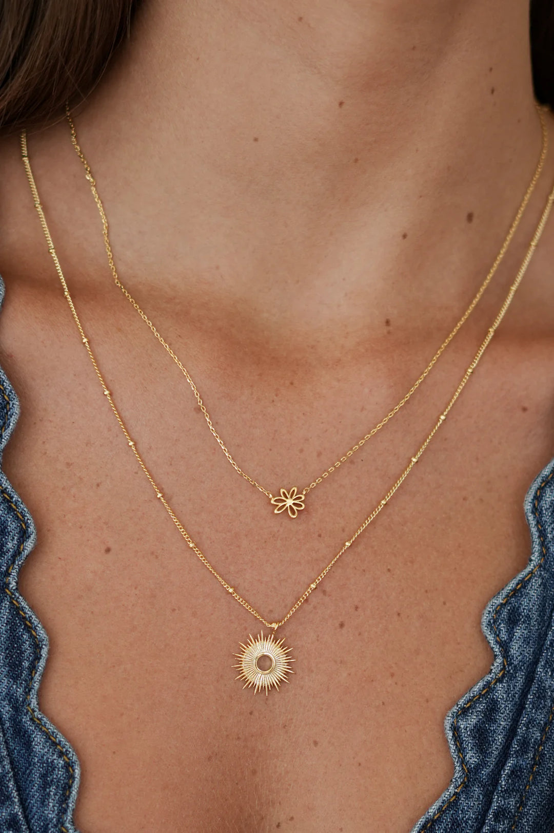 Estella Bartlett gold plated sunburst pendant necklace on delicate chain