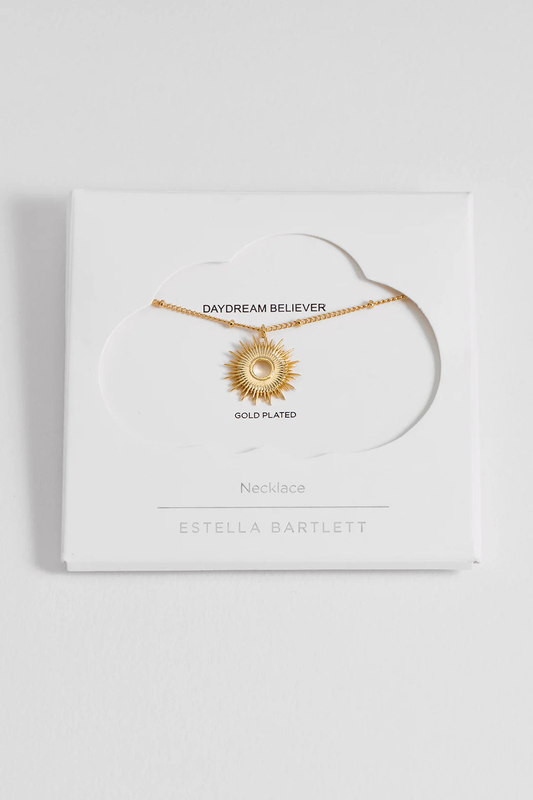 Estella Bartlett gold plated sunburst pendant necklace on delicate chain