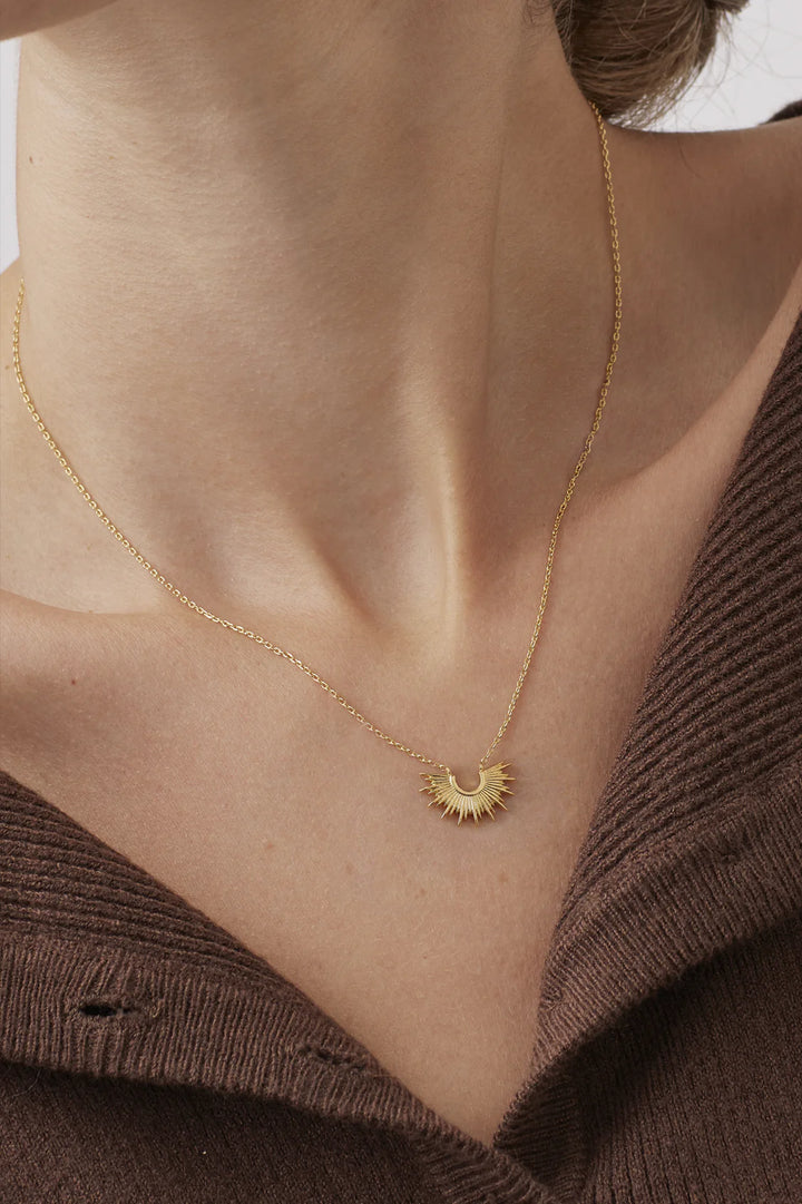 Estella Bartlett gold plated half sunburst necklace with delicate chain