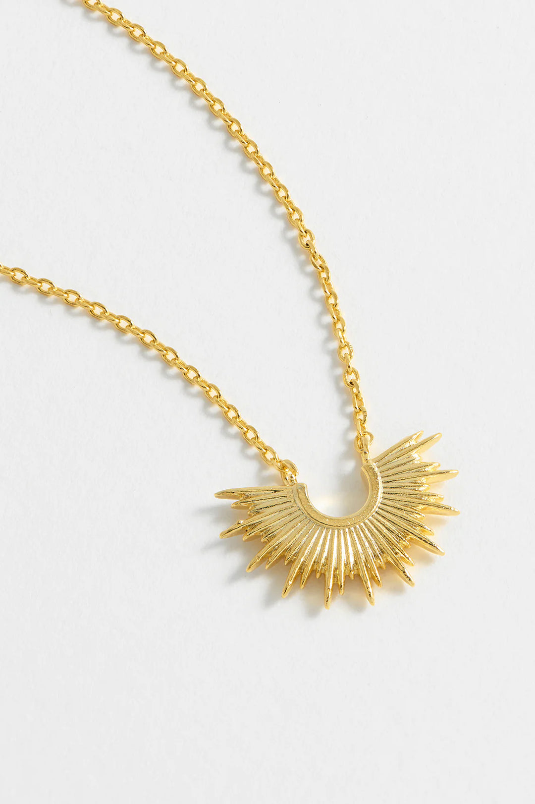 Estella Bartlett gold plated half sunburst necklace with delicate chain