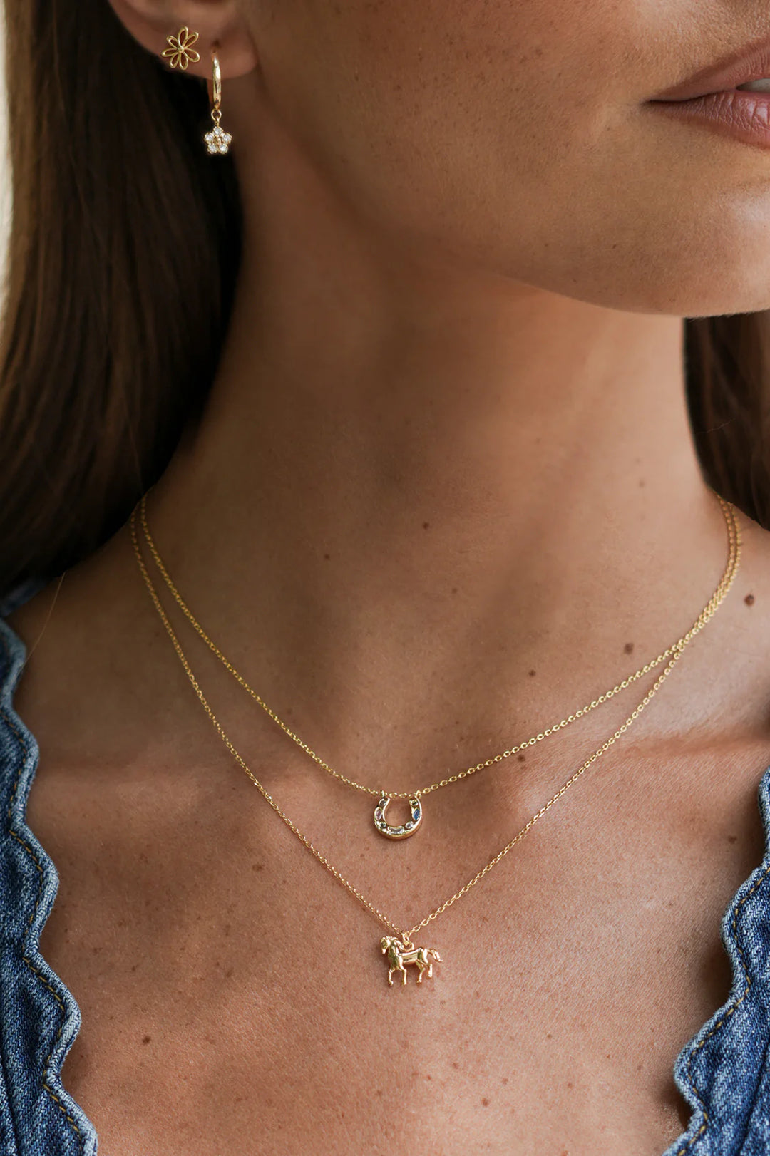 Estella Bartlett gold plated horse charm necklace on a delicate chain