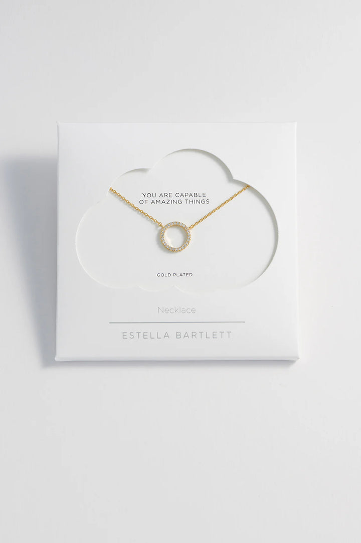 Estella Bartlett gold plated pave circle necklace with cubic zirconia stones