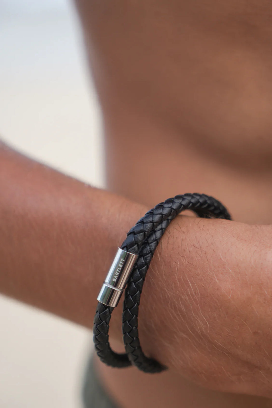 Estella Bartlett men’s double wrap braided leather bracelet with stainless steel clasp in black and brown