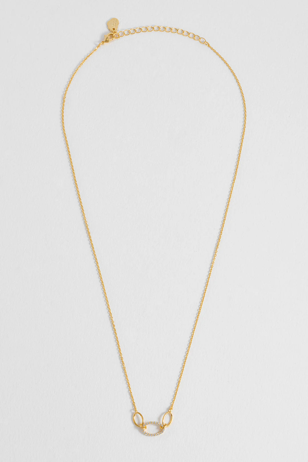 Estella Bartlett gold plated oval link necklace with cubic zirconia detail