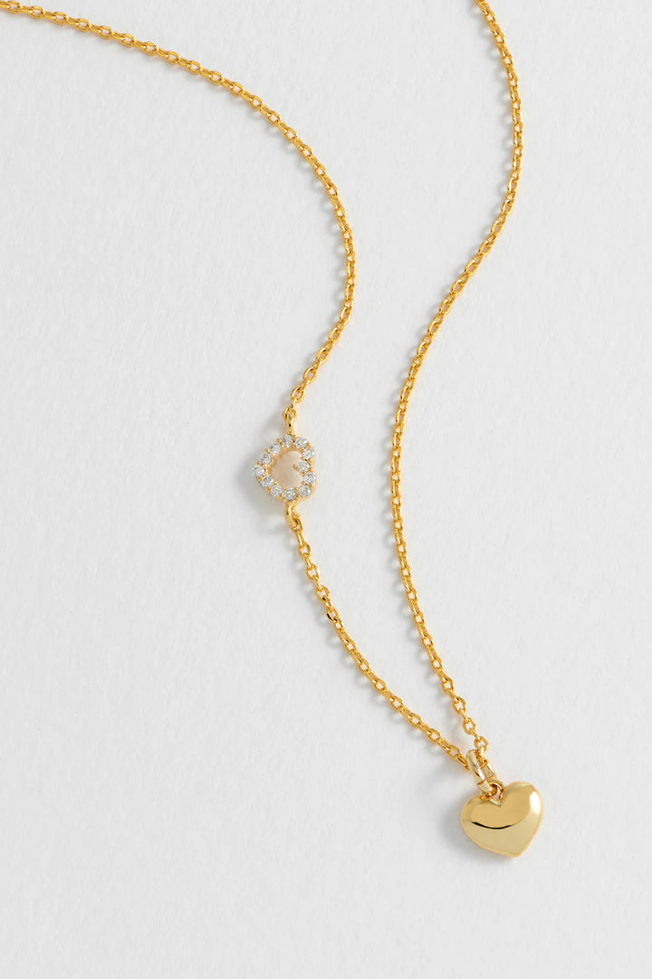 Estella Bartlett gold plated heart charm necklace with crystal heart detail