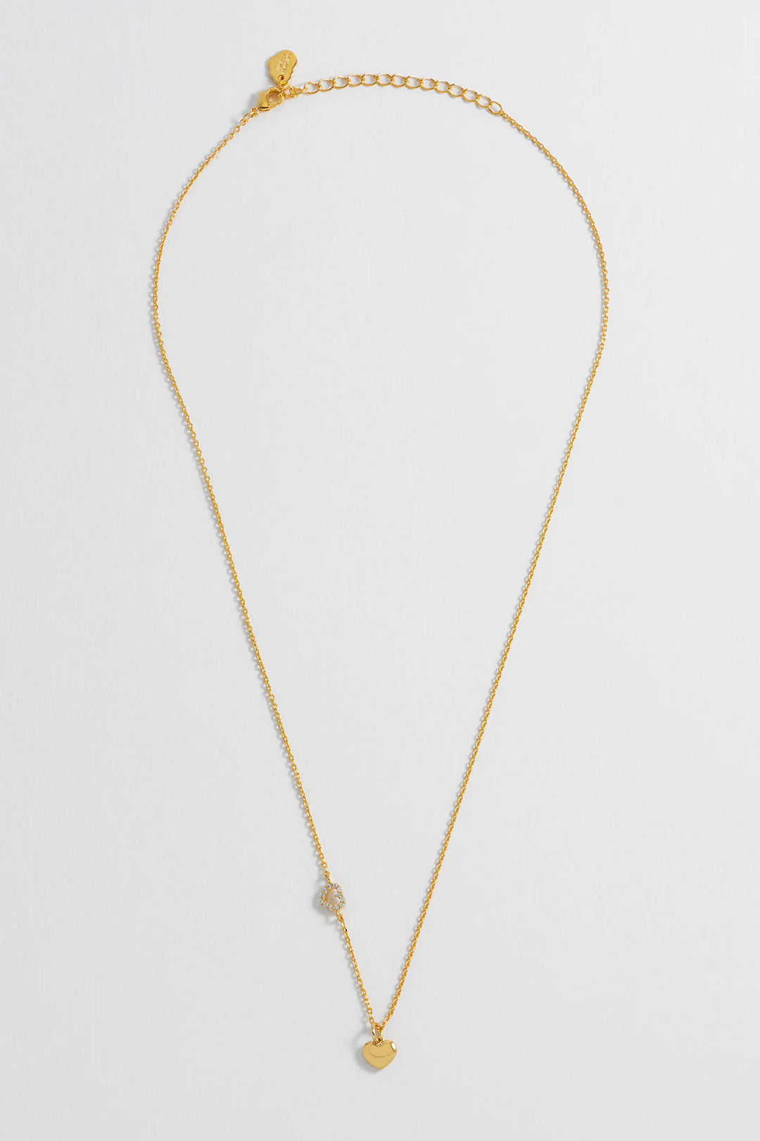 Estella Bartlett gold plated heart charm necklace with crystal heart detail