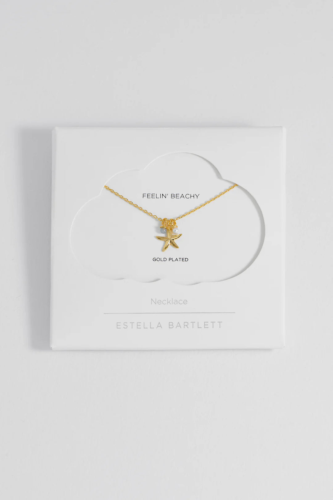Estella Bartlett gold plated starfish charm necklace with pearl and blue agate details