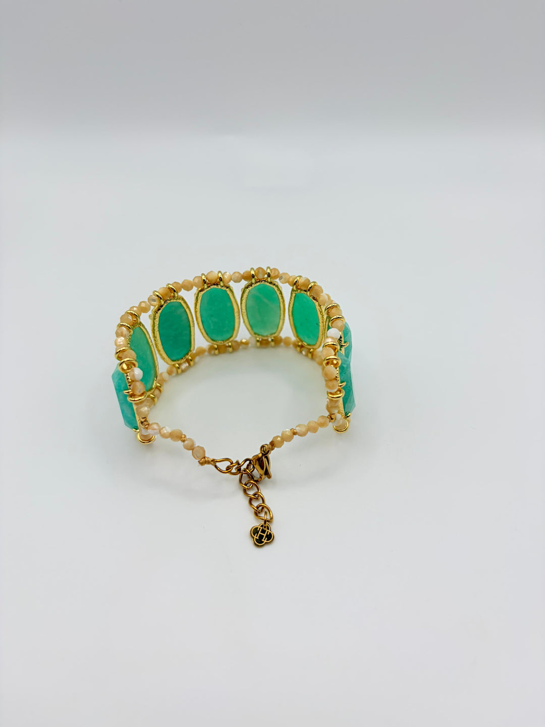 Habaha green stone statement bracelet with faceted gemstones and gold-tone detailing