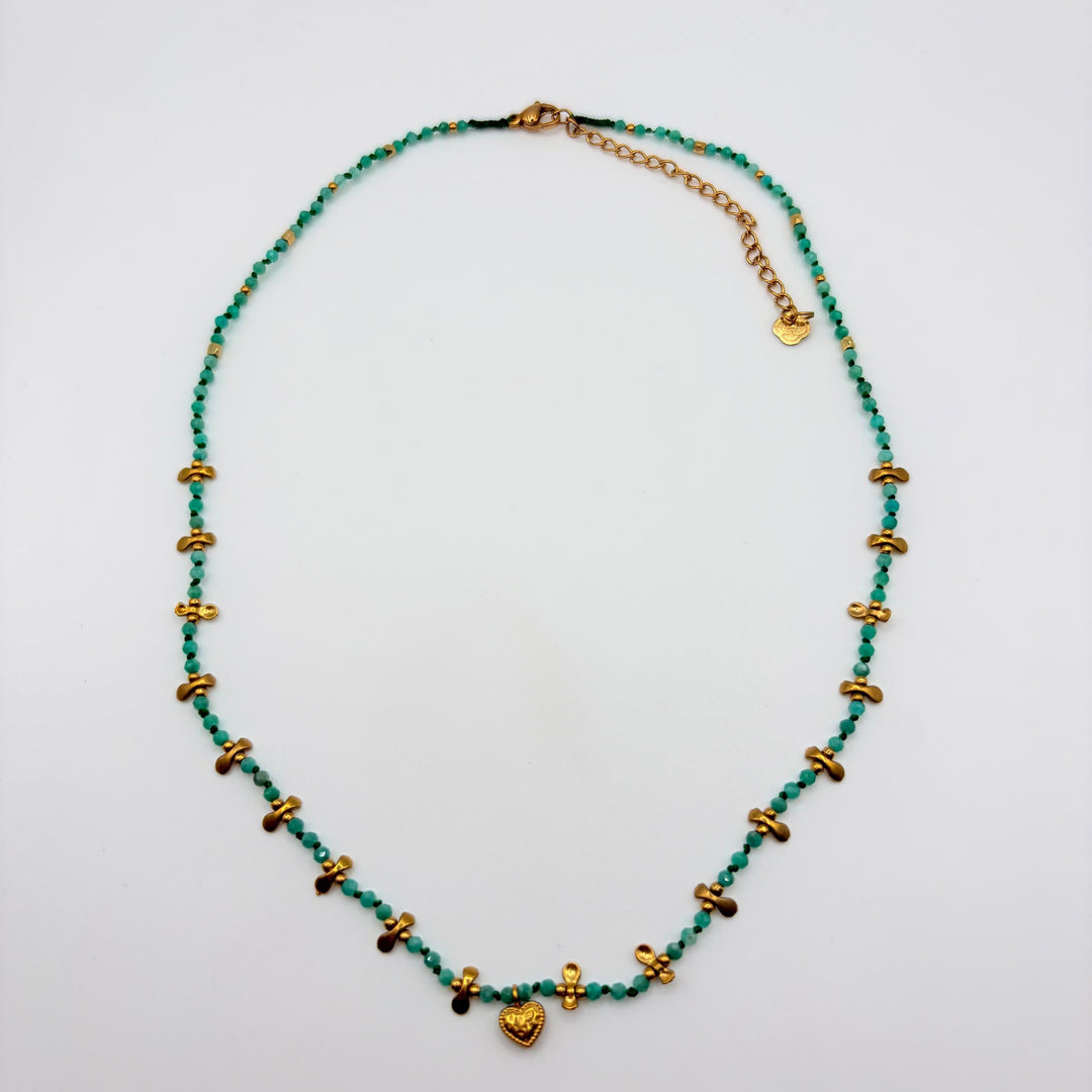 Amara turquoise heart charm necklace with faceted beads and delicate gold-tone details by Habaha