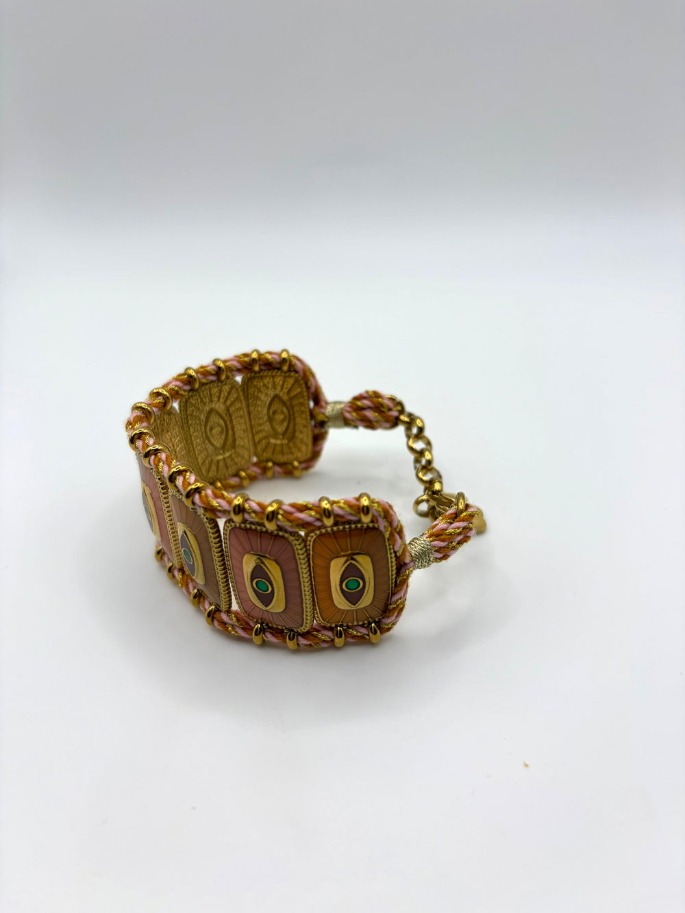 Habaha evil eye statement bracelet with pink braided cord, gold-plated details and turquoise eye motifs
