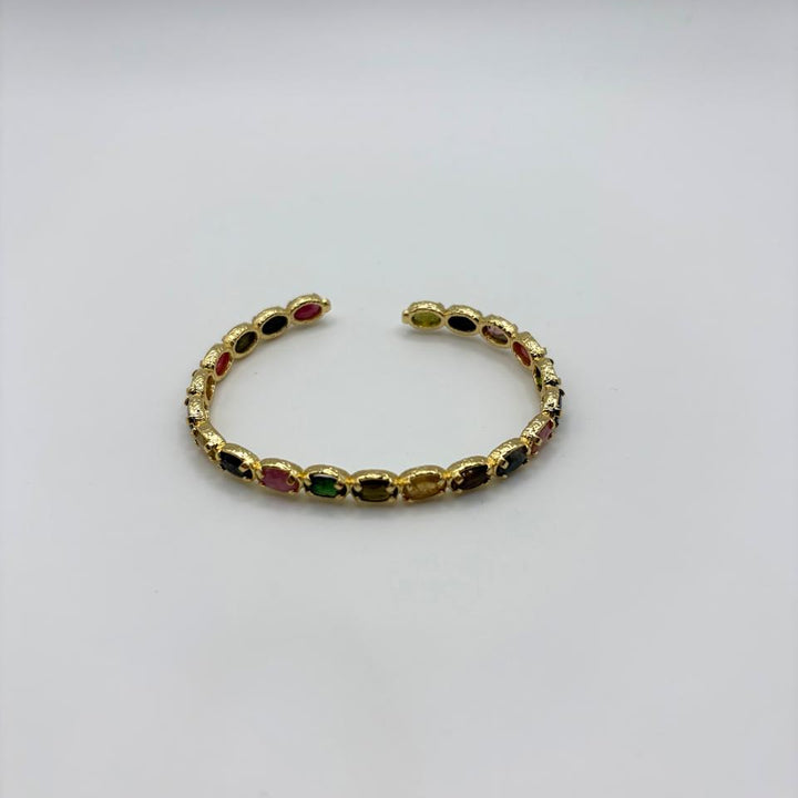 Habaha gold cuff bracelet with multicolor gemstone accents and textured finish