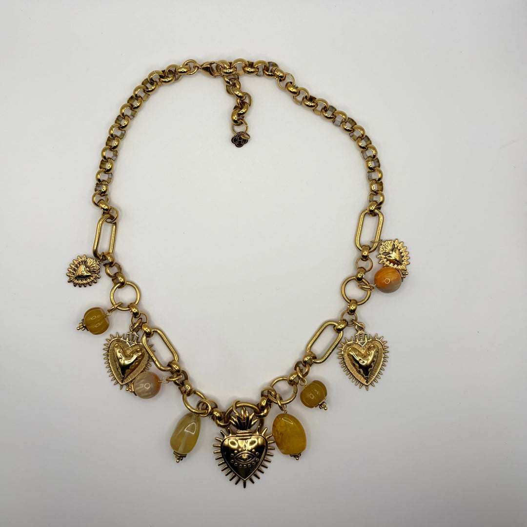 Habaha gold sacred heart necklace with natural stone charms, mixed chain links and vintage-inspired pendants