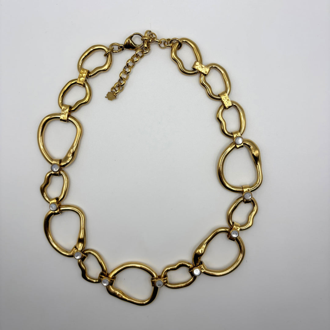 Habaha gold link necklace with organic shaped links and pearl accents in a modern statement design