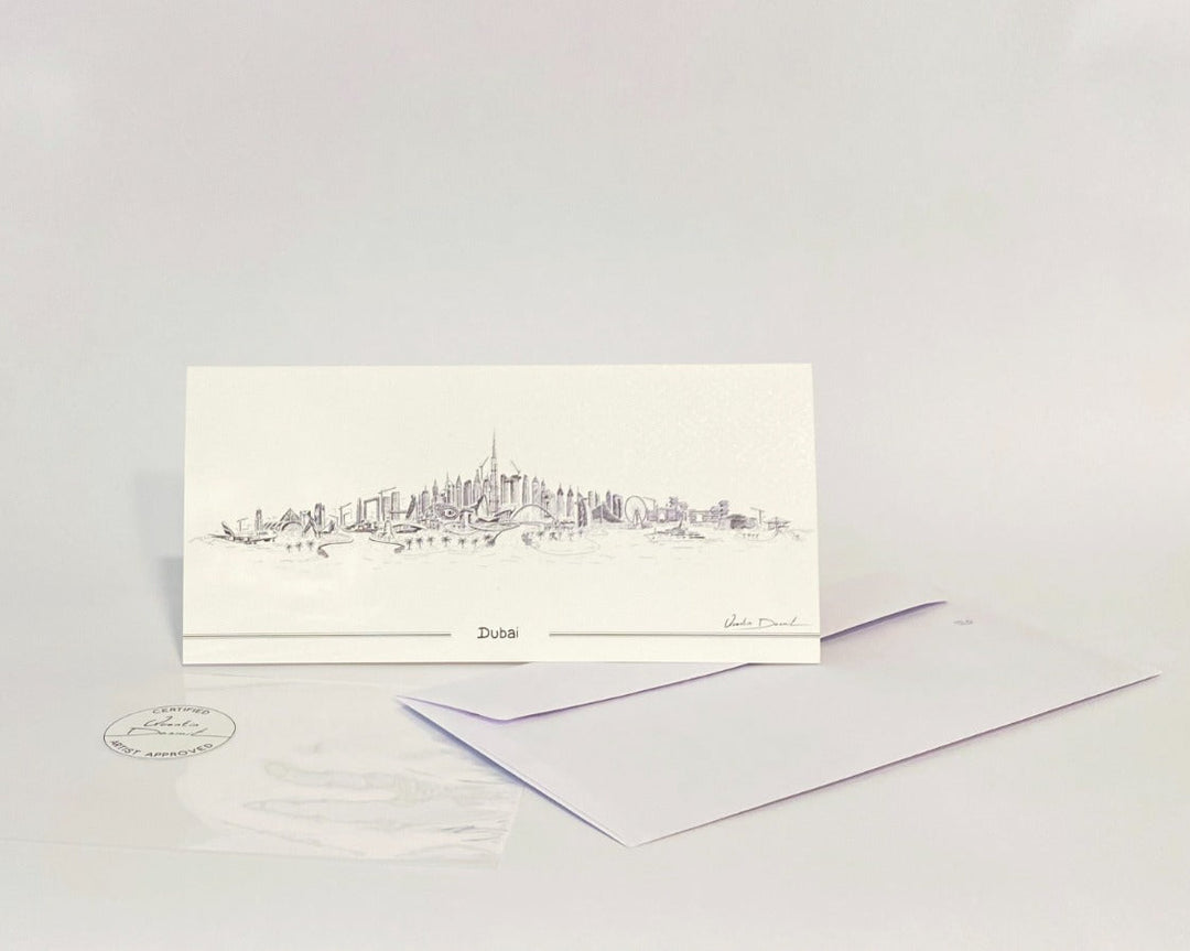 Dubai skyline illustrated folded greeting card with white envelope and minimalist luxury stationery design.