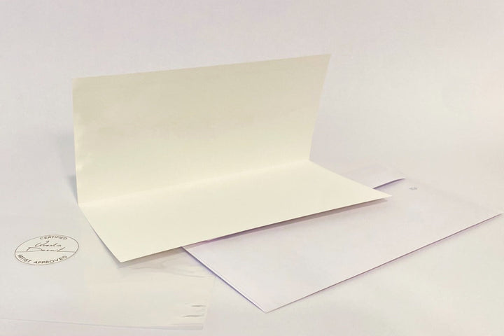 Dubai skyline illustrated folded greeting card with white envelope and minimalist luxury stationery design.