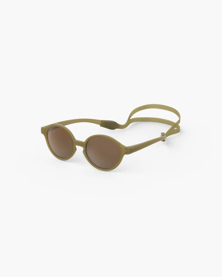 IZIPIZI Baby #D Glossy Kaki polarized sunglasses for toddlers aged 0–3 with a glossy semi-translucent khaki frame