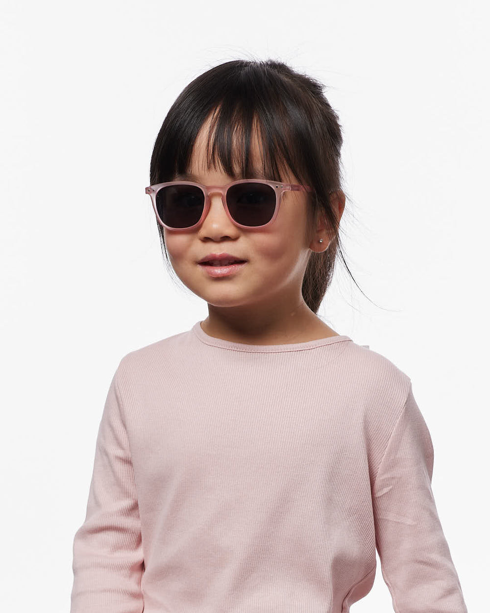 IZIPIZI CHILD #E Pink polarized kids sunglasses with soft pink rectangular frame and grey-green polarized lenses