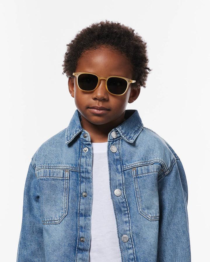 IZIPIZI CHILD #E Yellow Honey polarized kids sunglasses with translucent yellow frame and green polarized lenses